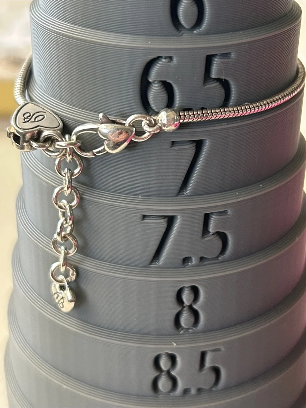 Brighton snake charm bracelet with “Flower Child” enamel colorful bead charm